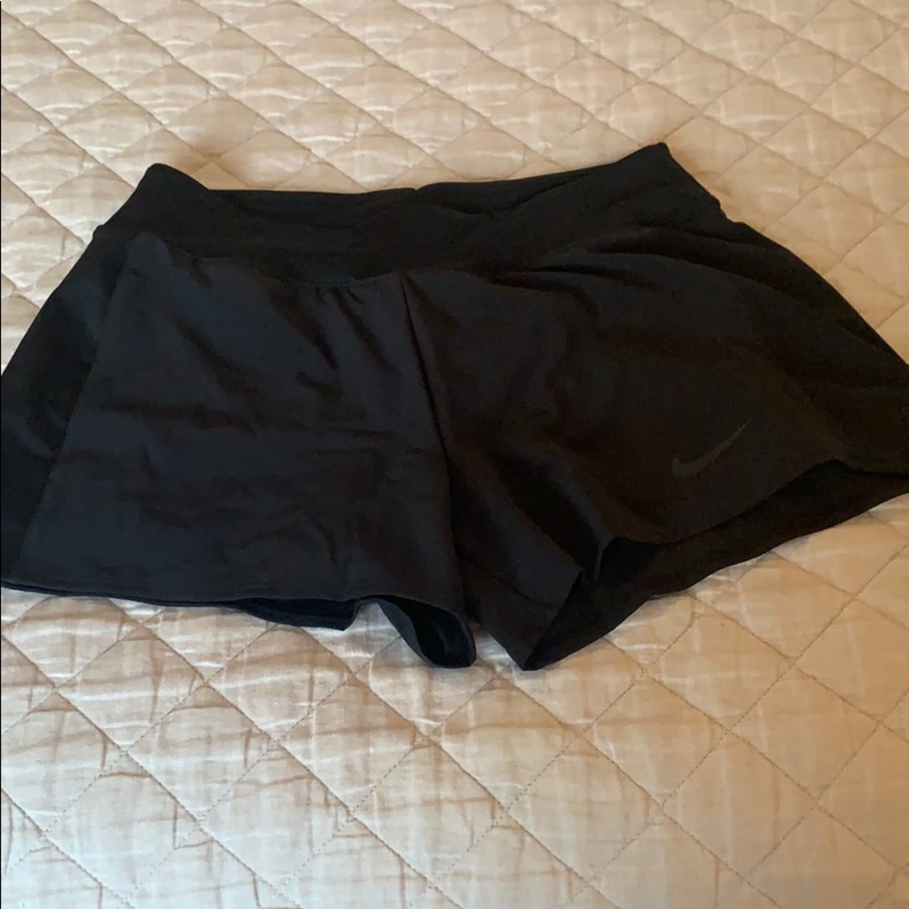 Nike black tennis shorts, size M